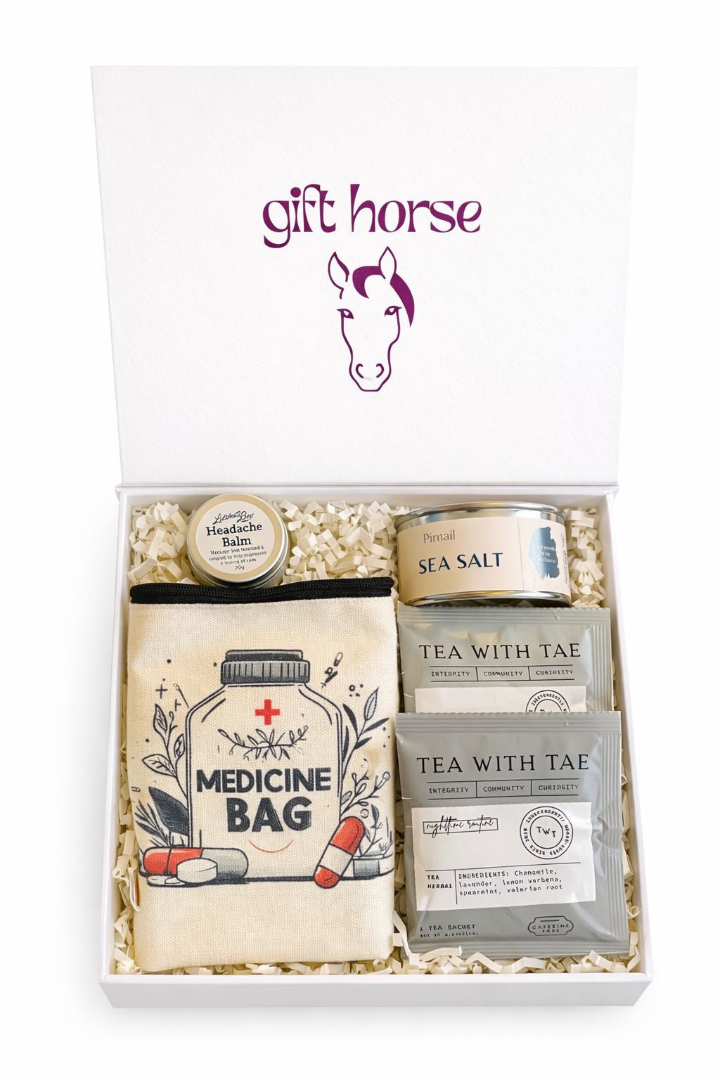 Gift box image: THOROUGHBRED luxury gift box open showing contents including candle, tea and balm